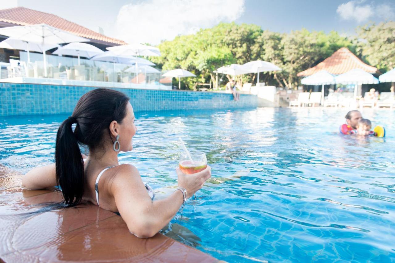 The Capital Zimbali Hotel Ballito Kültér fotó A woman relaxing at a pool