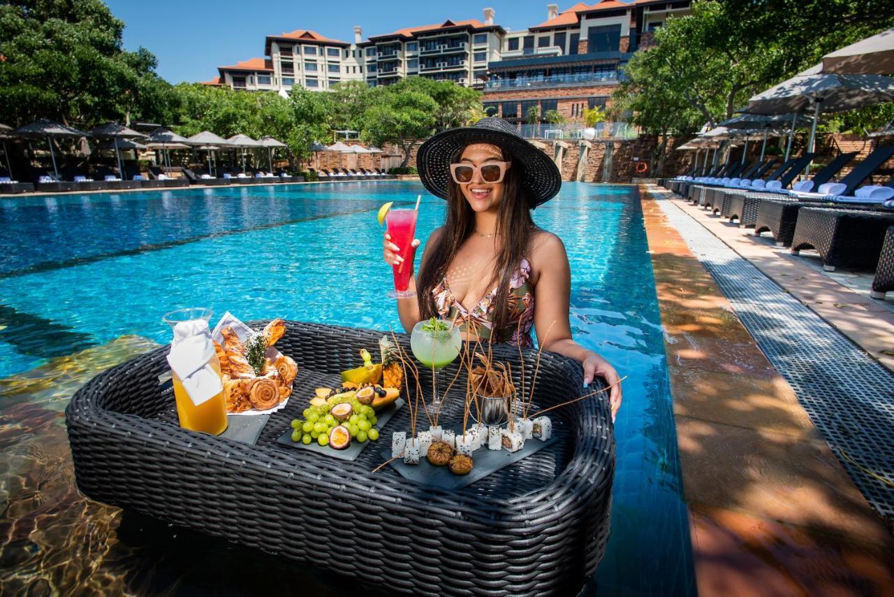 The Capital Zimbali Hotel Ballito Kültér fotó Poolside at the hotel