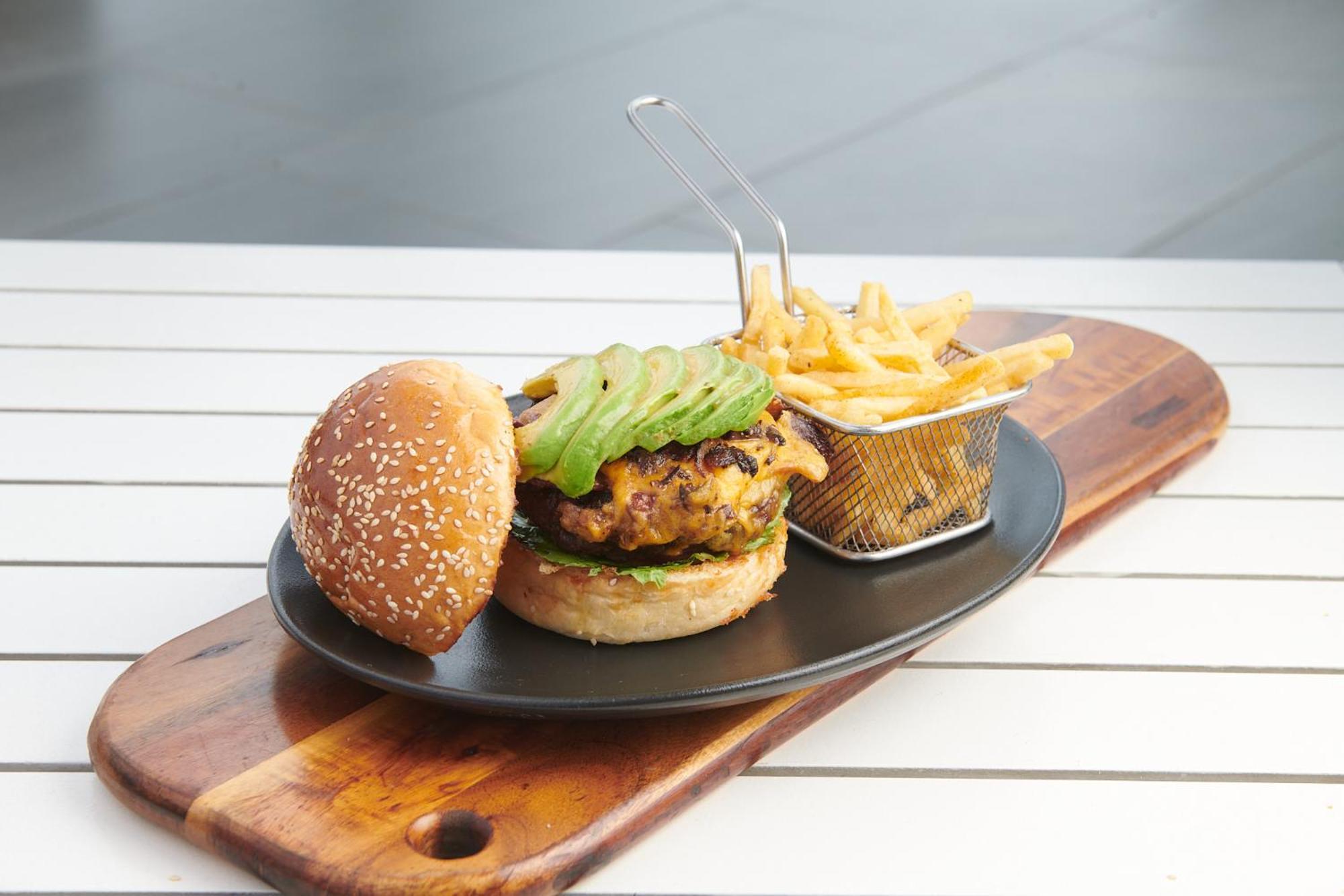 The Capital Zimbali Hotel Ballito Kültér fotó A vegan burger with avocado and chips