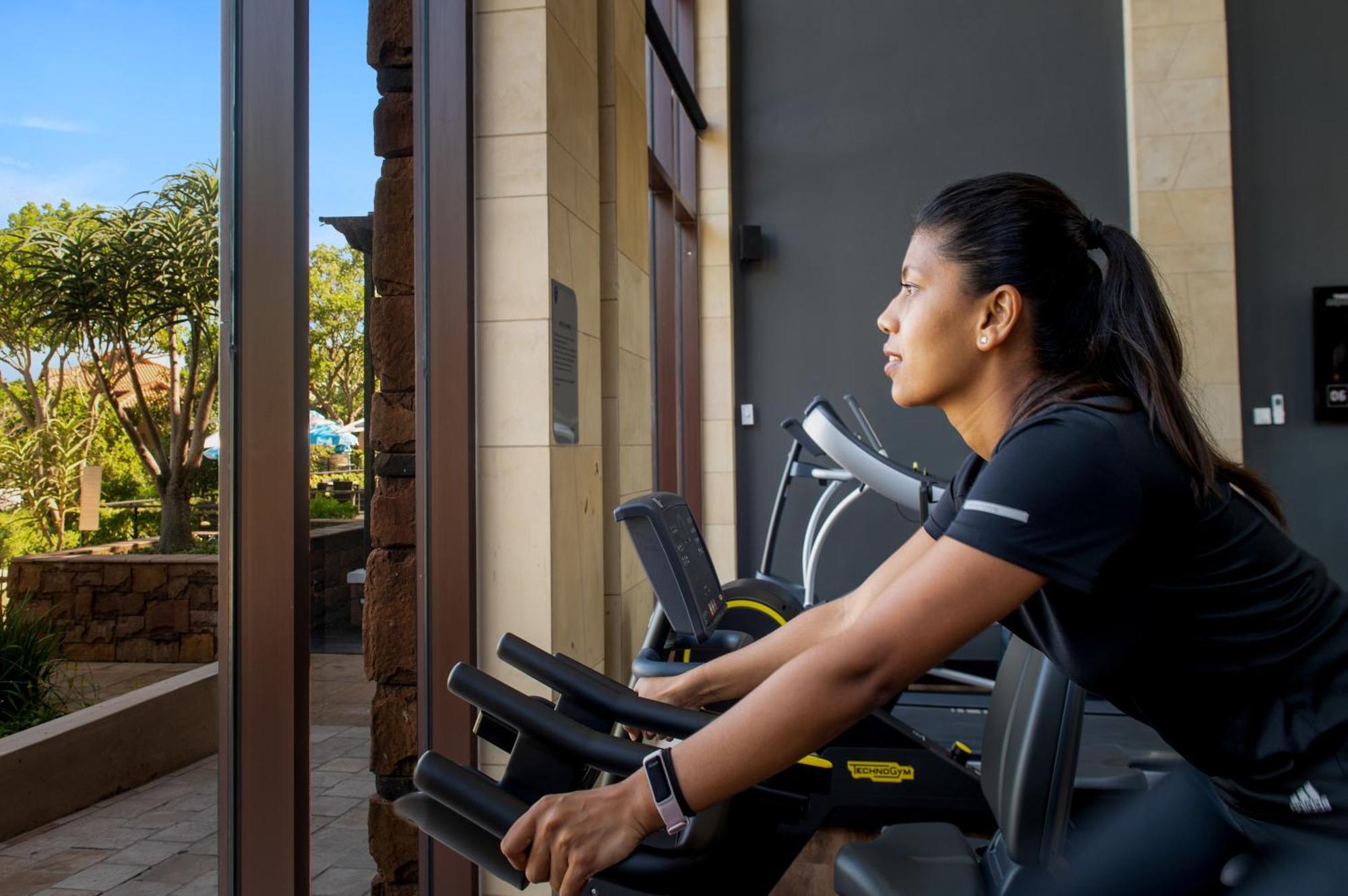 The Capital Zimbali Hotel Ballito Kültér fotó A woman on a treadmill